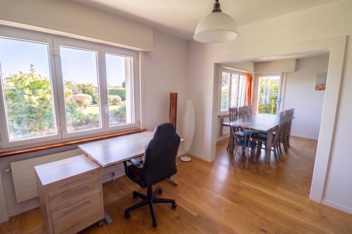 ai-enhanced__6WJoQ-PVh6Xo5QG8znFe2 Appartement avec grand jardin et vue panoramique sur le lac